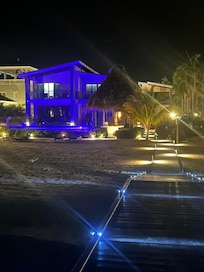 House from the dock at night.