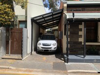 one lane street only - parking is ok for small cars only - not only it's narrow but has to come over a sharp corner in that precise place due to also very narrow, one lane street.