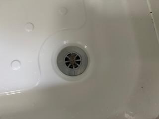 HAIR in drain- not ours 