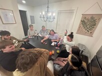 Playing games & having laughs in the kitchen of the Troy House