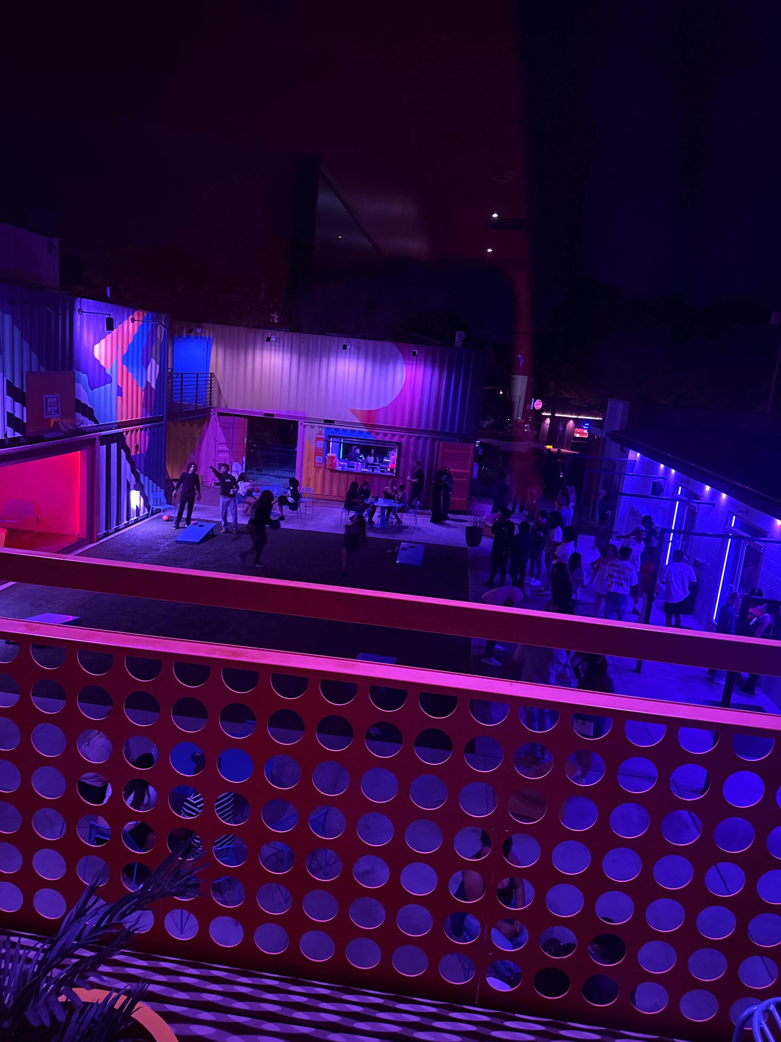 The nightclub is literally outside your (glass) door. The room shakes. 