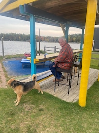 Grandpa and Maddie at the tiki bar.