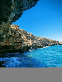 Walk through the tunnel at the first beach at the bridge to find this view.