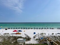 View from balcony and the beach chairs included with the stay