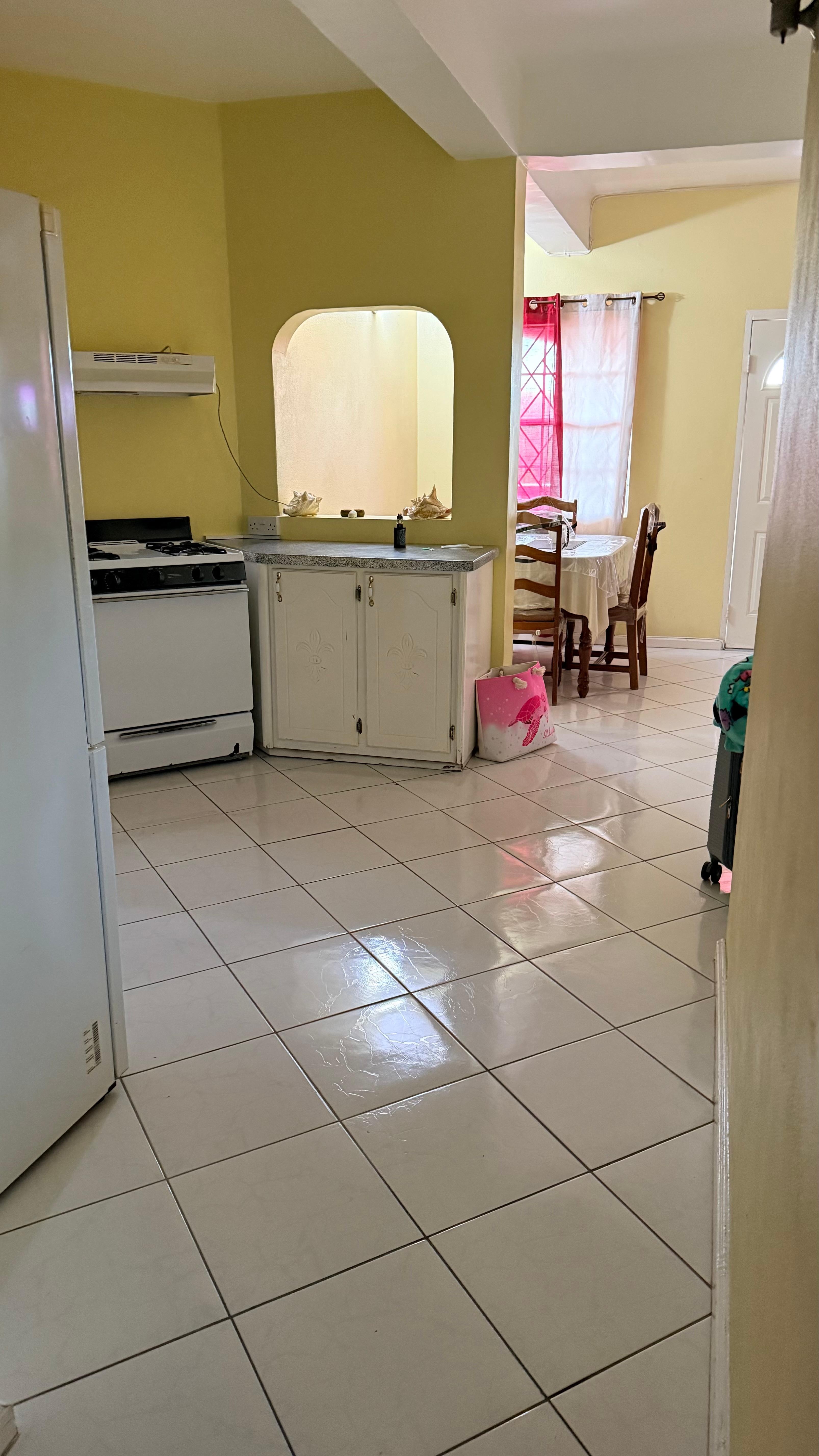 Picture of part of the kitchen and eating area. 