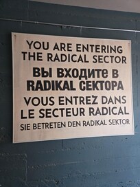 Sign outside the front door helps get you ready to see something completely unexpected