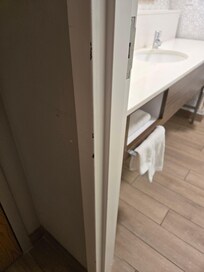 Paint scraped off several places, loose carpet, I didn't take pictures of