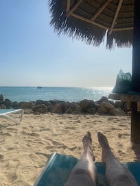 Hotel is right on the beach with chairs, towels and cabanas included