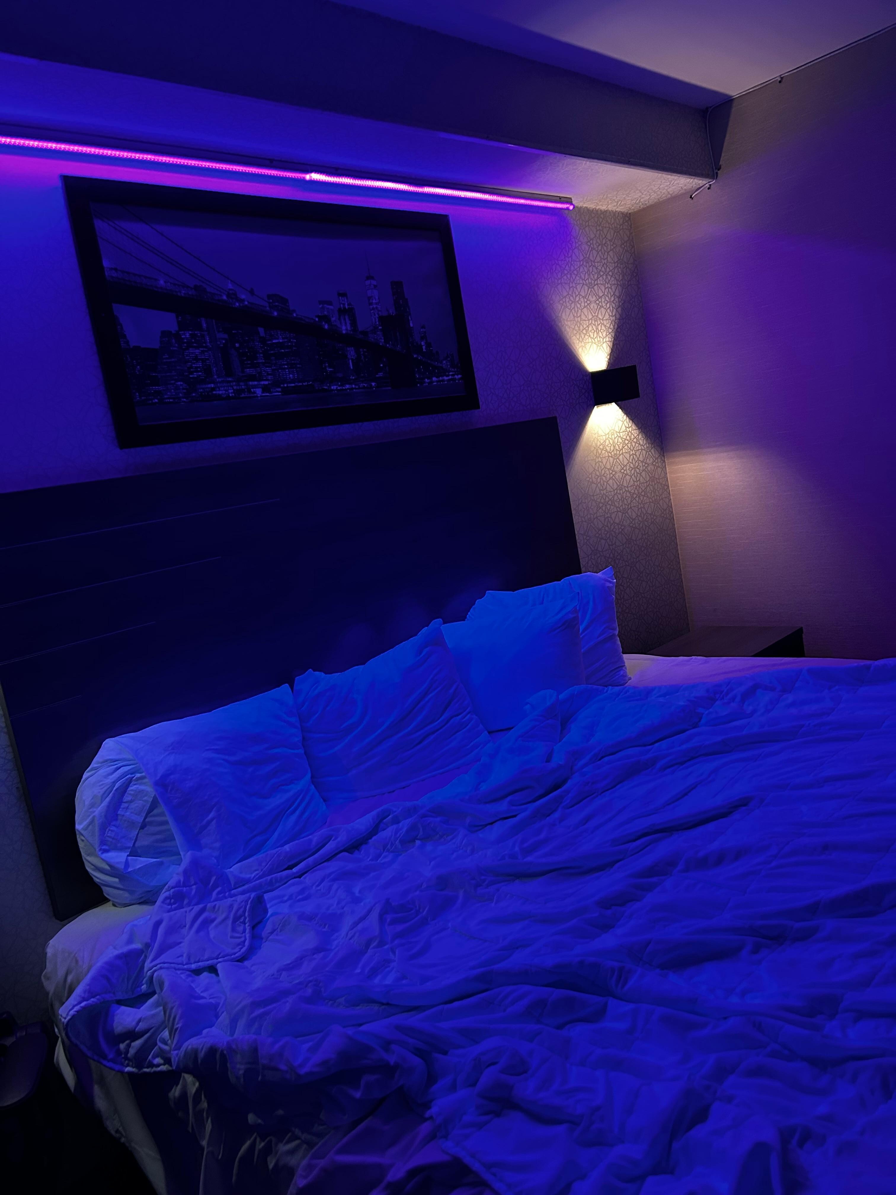 One thing I really like about this Hotel. Is the lighting one light reflects a seductive mood and the other light is just regular - very nice setting!
