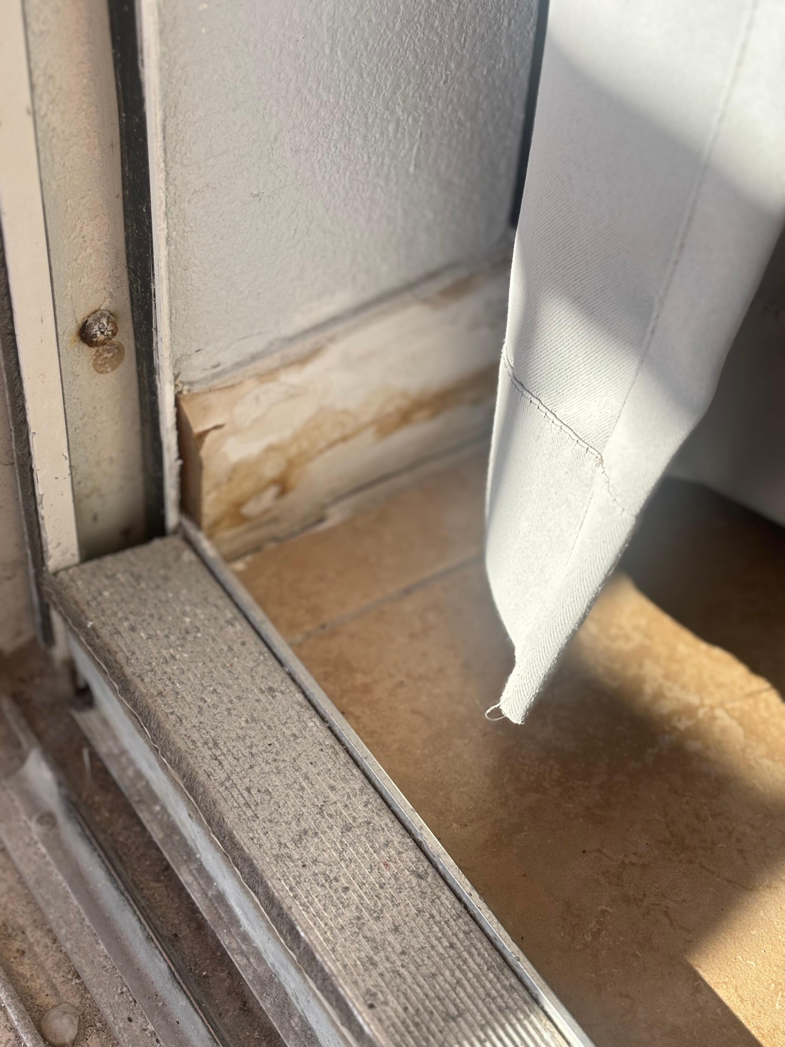 Water stains and a patio door that is very hard to open and should be replace