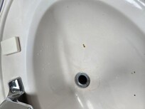 Cigarette burns in sink