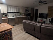 Kitchen and part of living/family room.