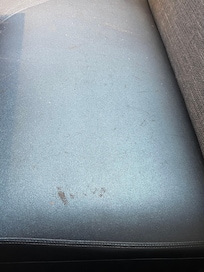 Booth seats were filthy and covered in food crumbs.