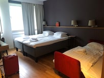 Rummet för tre personer