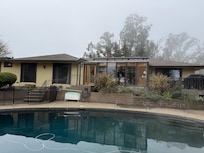 The back of the house had doors from several areas, and a nice patio for outdoor dining.