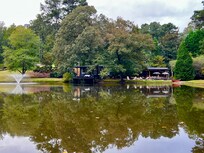 View of the cottage from the other side of the pond.
