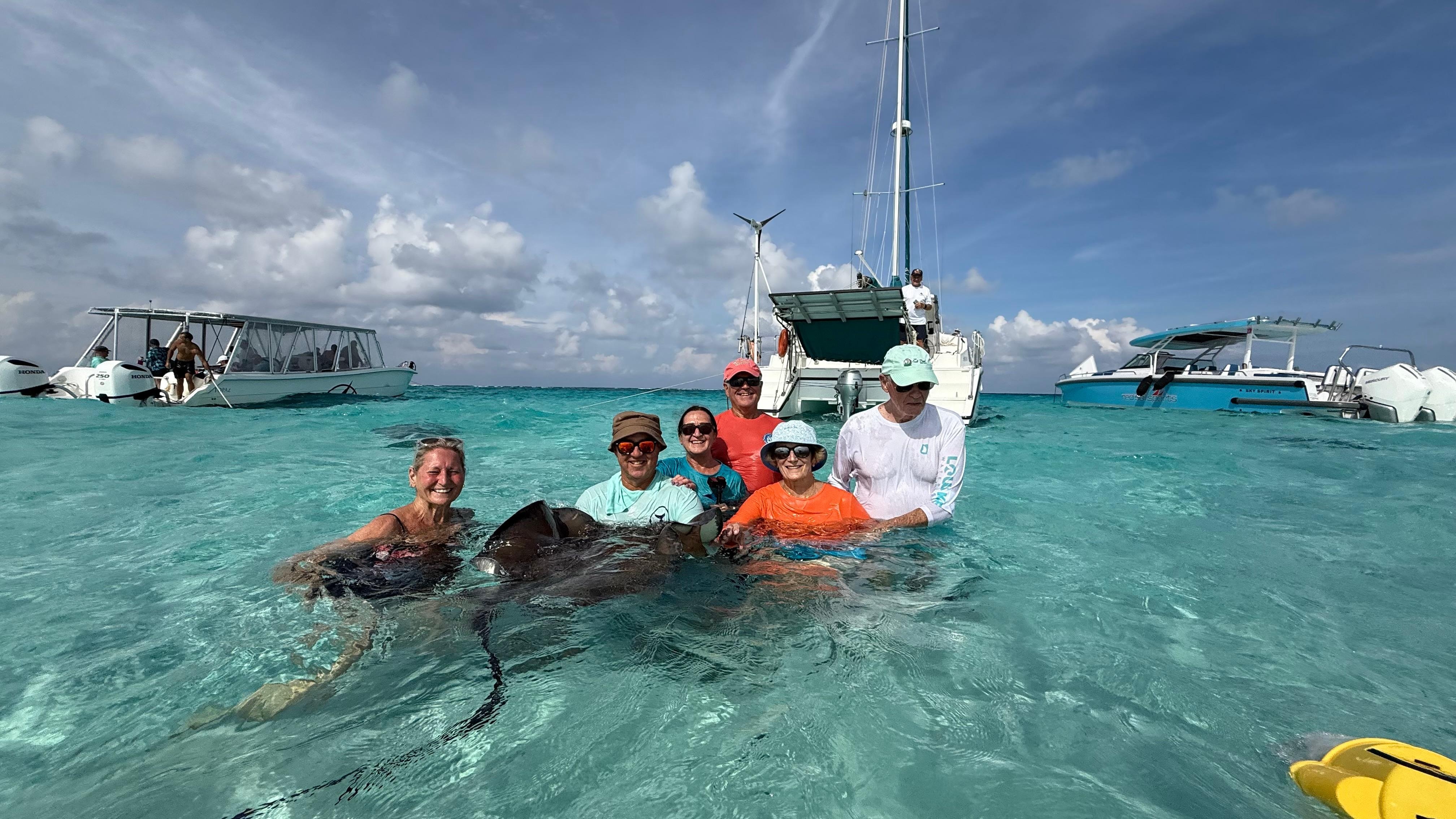 Boat picked us up for a trip to stingray city. This house has a private dock.
