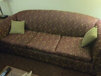 Couch showing some wear