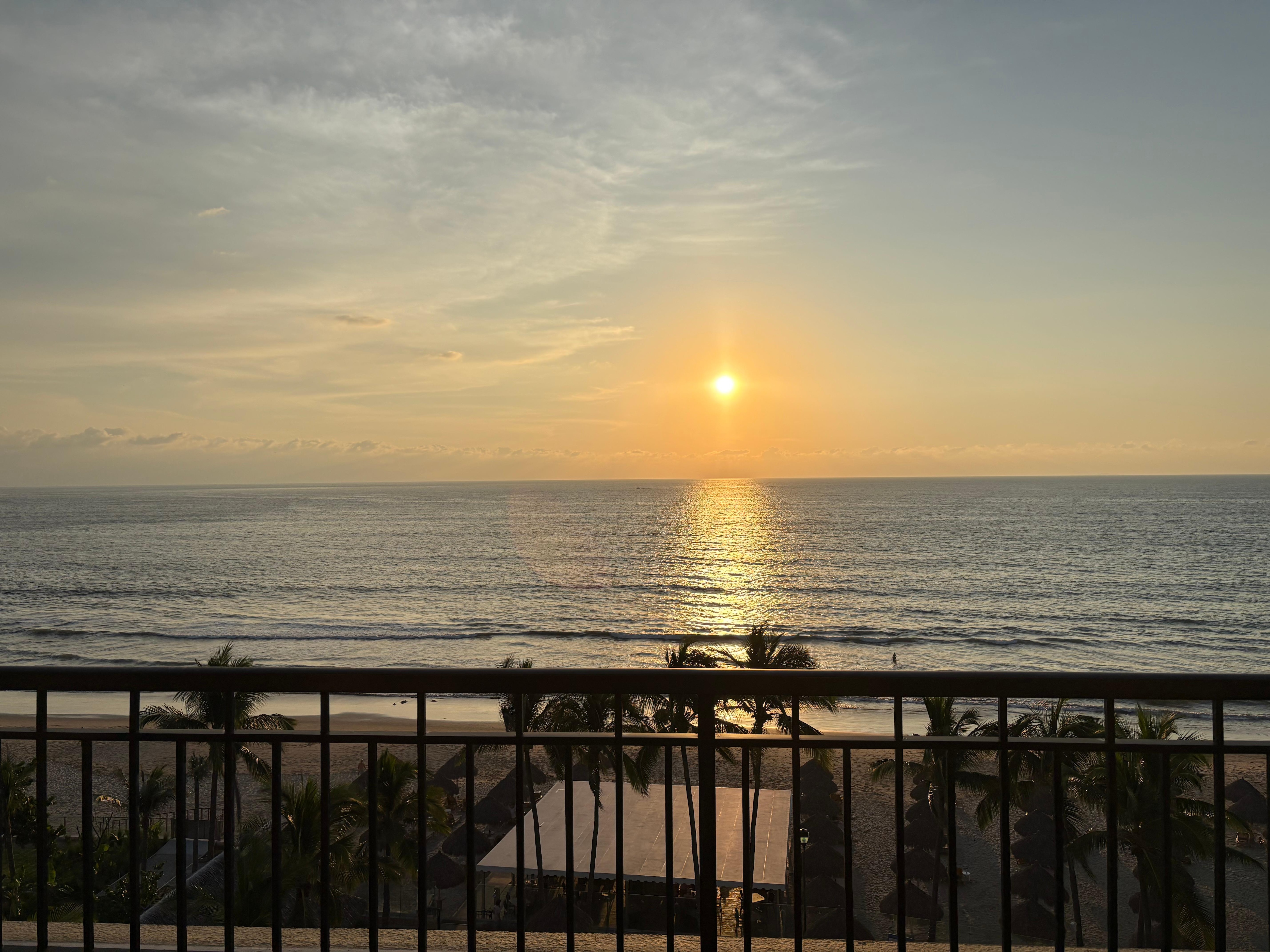 A sunset from the condo’s seventh floor balcony. 