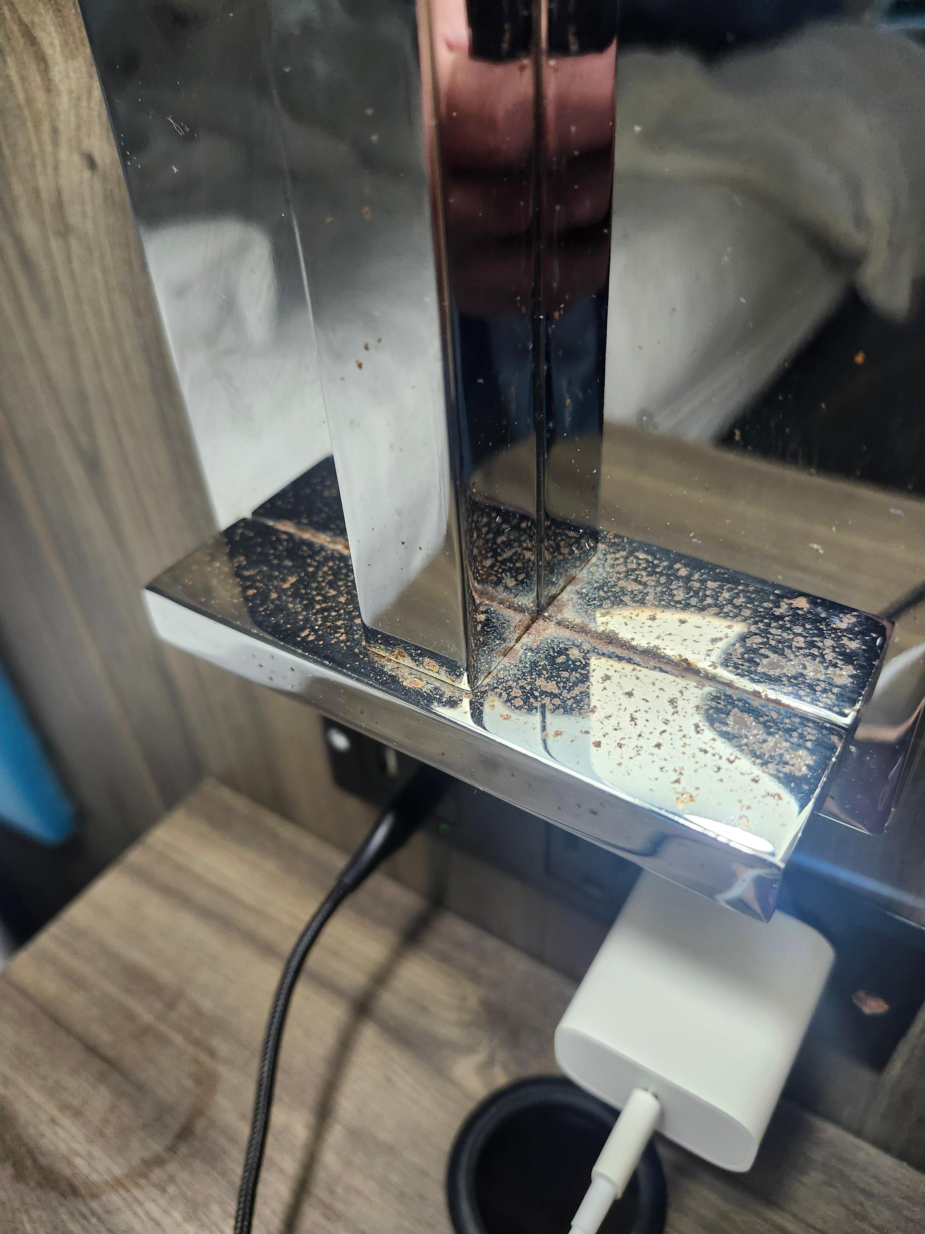 Night light next to bed was rusty.