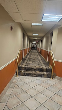 Two steps at our end, 5 or 6 at the other to get to the front desk.