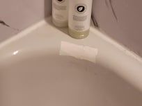 Bath repaired with tape...
