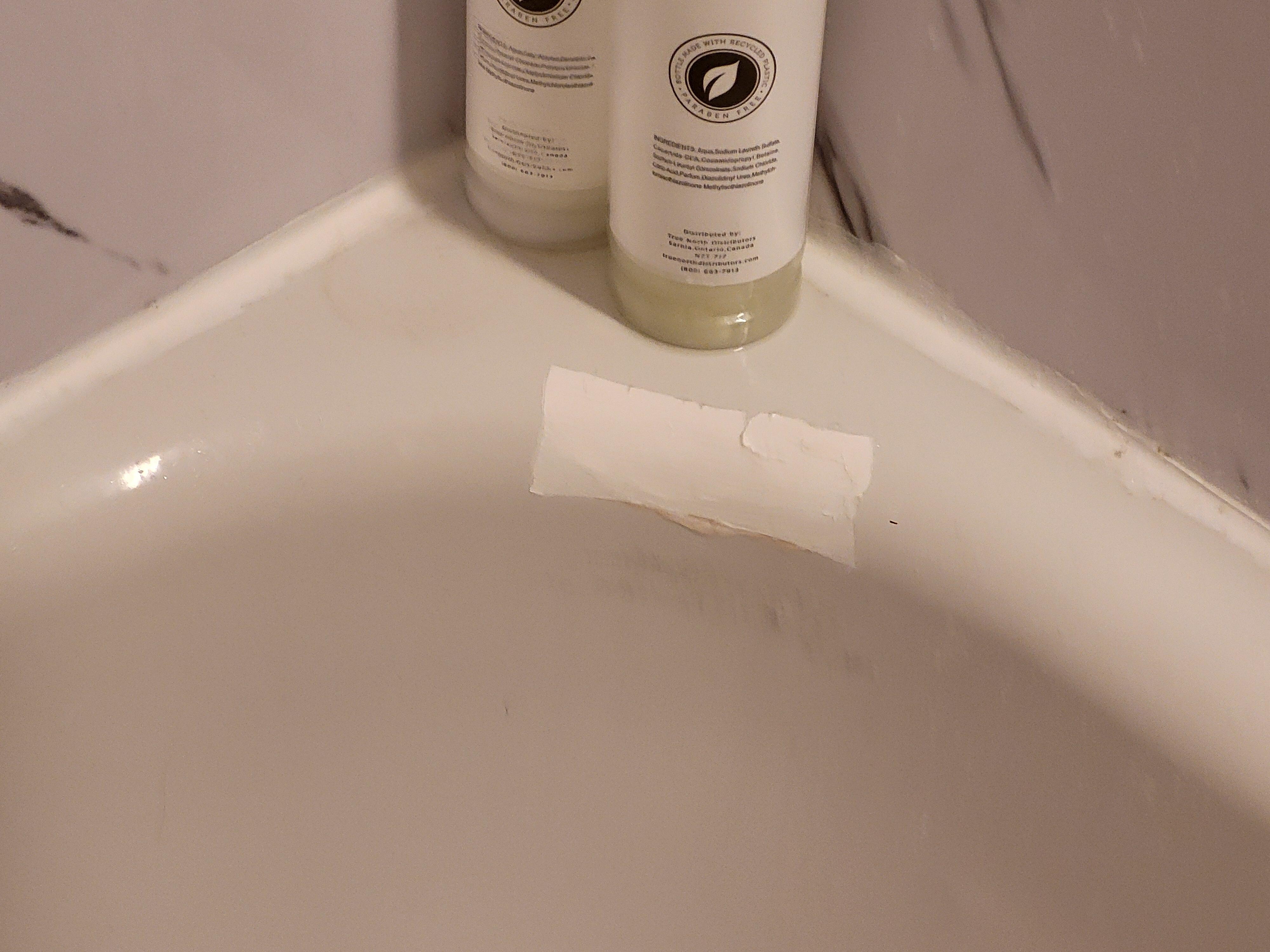 Bath repaired with tape...