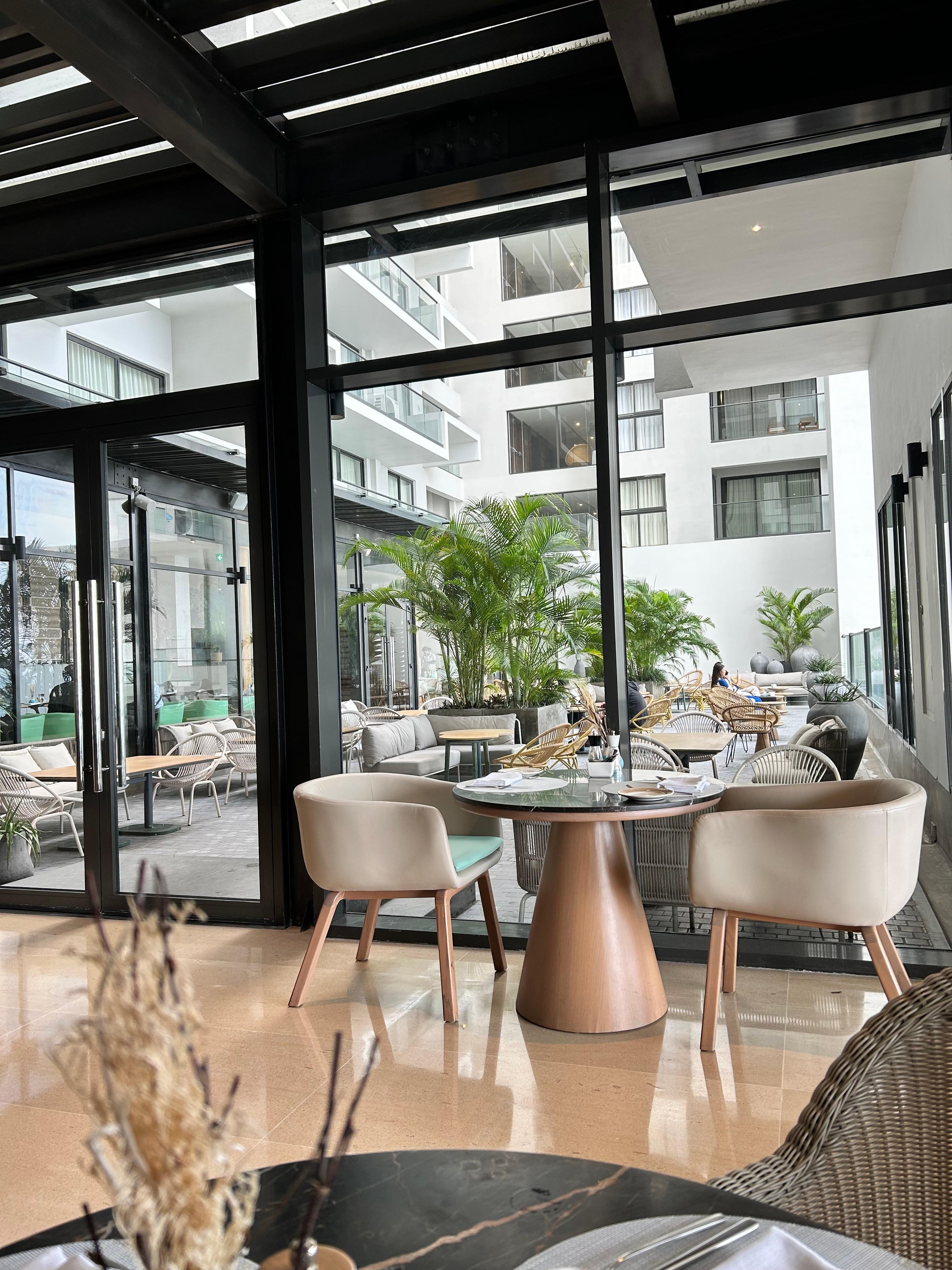 Dining area with view of patio. 