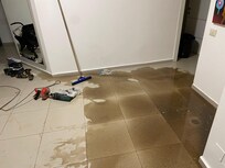 Filthy sewer water all over the living room. This got on our belongings in the apartment without any apology or explanation.