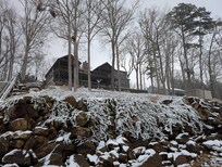 A snowy lake house