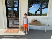 Front door of the house. With the cute fall decor they had.