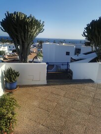 Steps opposite the terrace down to the street/Spar below, so convenient