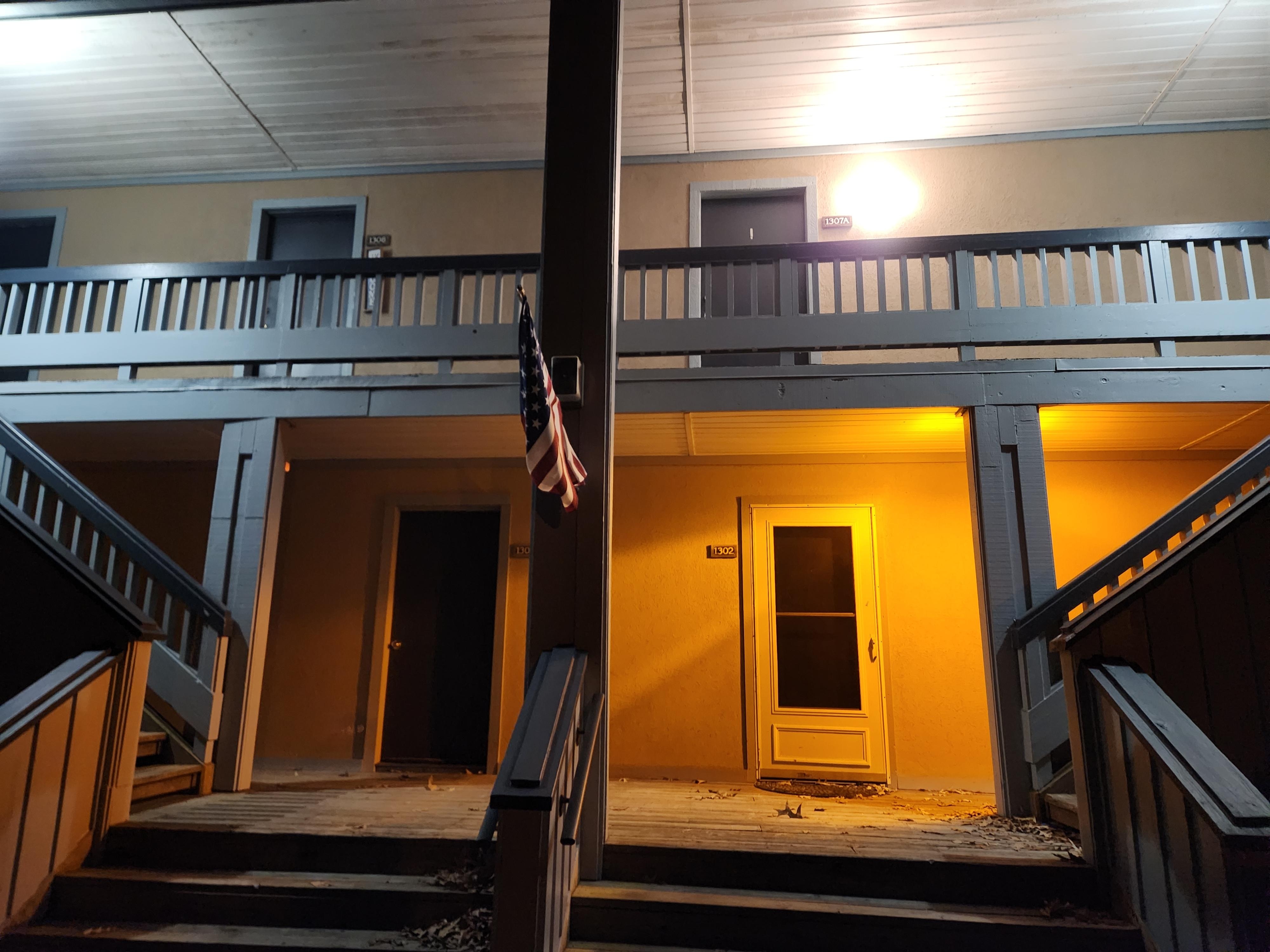 Entrance at front, outside stairs to the left, to the second floor