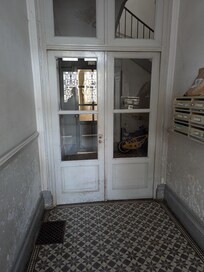 Interior locked door. Could not enter without a key. Was told "go up to the 5th floor to receive the keys."