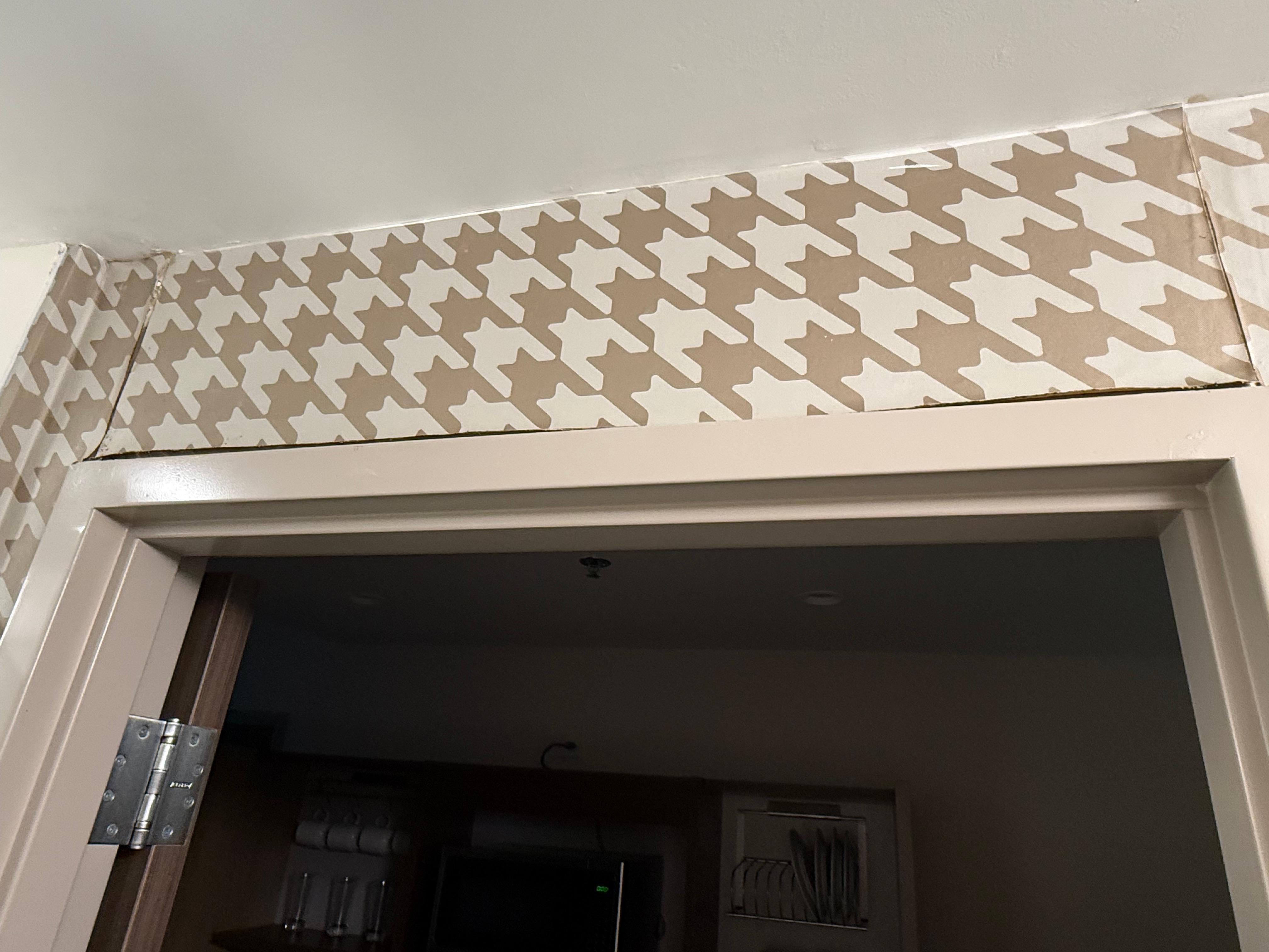 The wallpaper and shower is the area affected by the black mold and mildew. The wallpaper was is noticeably lifted and peppered with black mold. Also the  ceiling has evidence of water leakage.