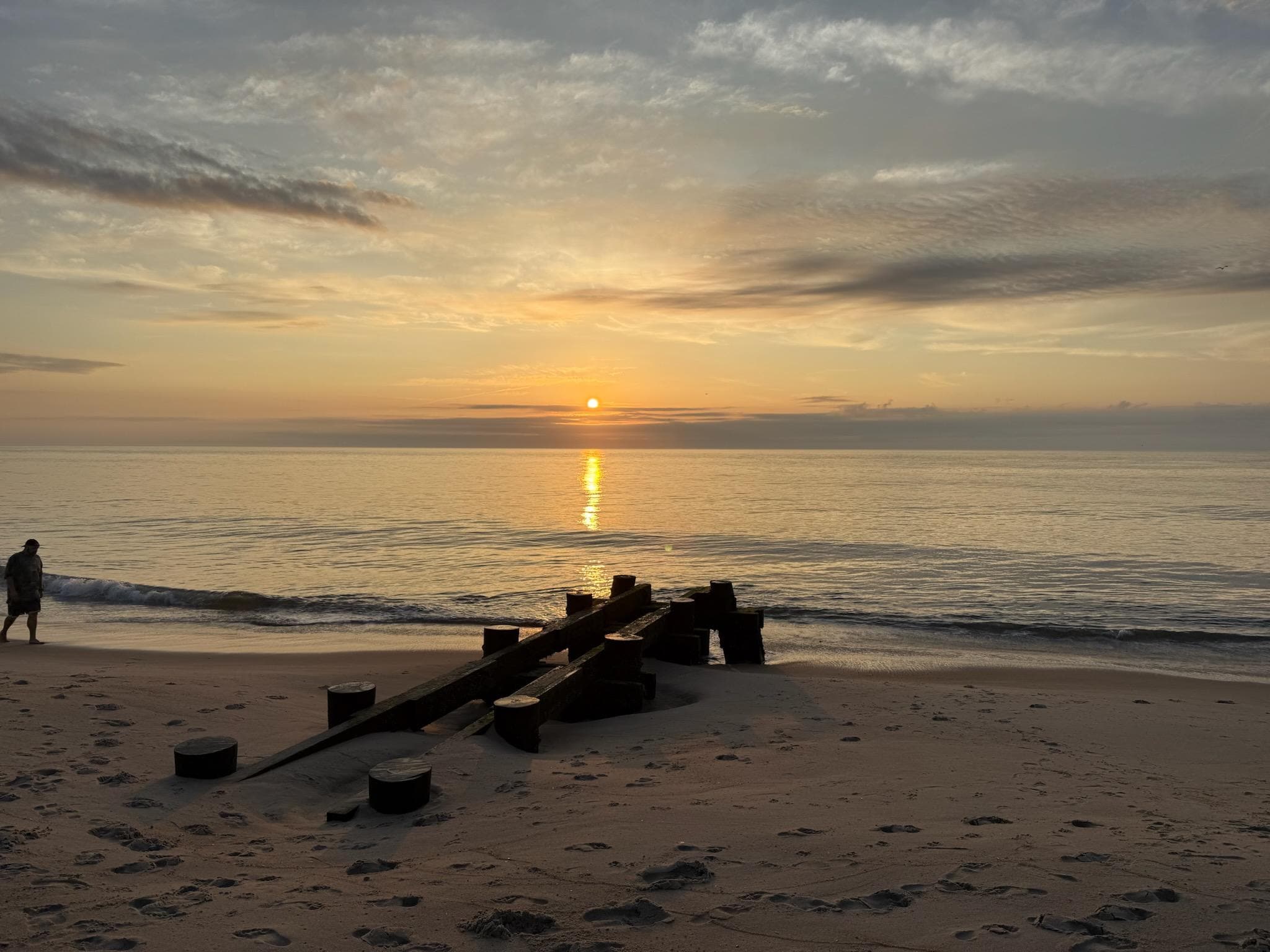 Sunrise on beach in front of condo