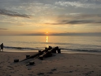 Sunrise on beach in front of condo