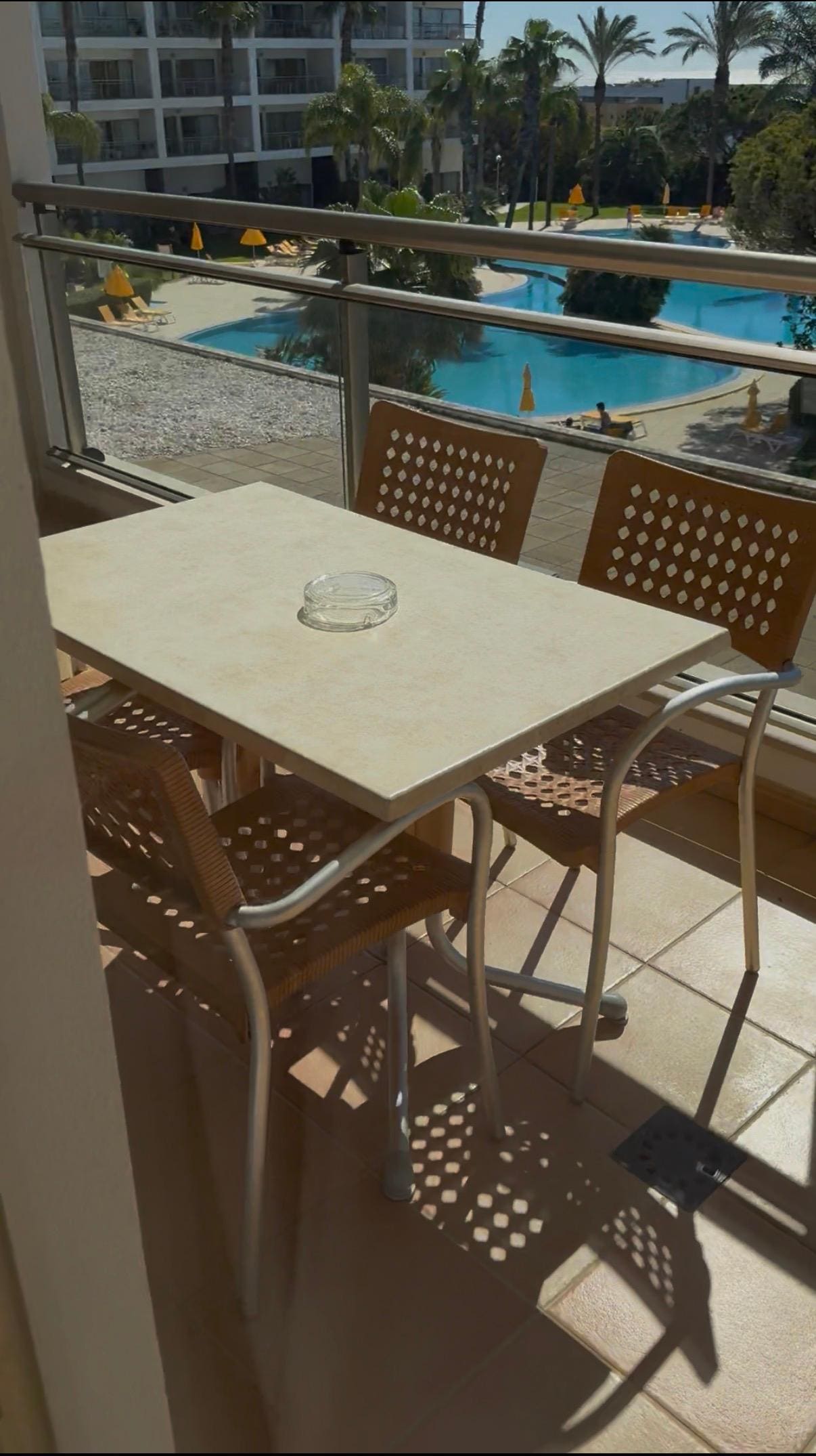 Balcony with pools view (sea view on other picture is on the right)