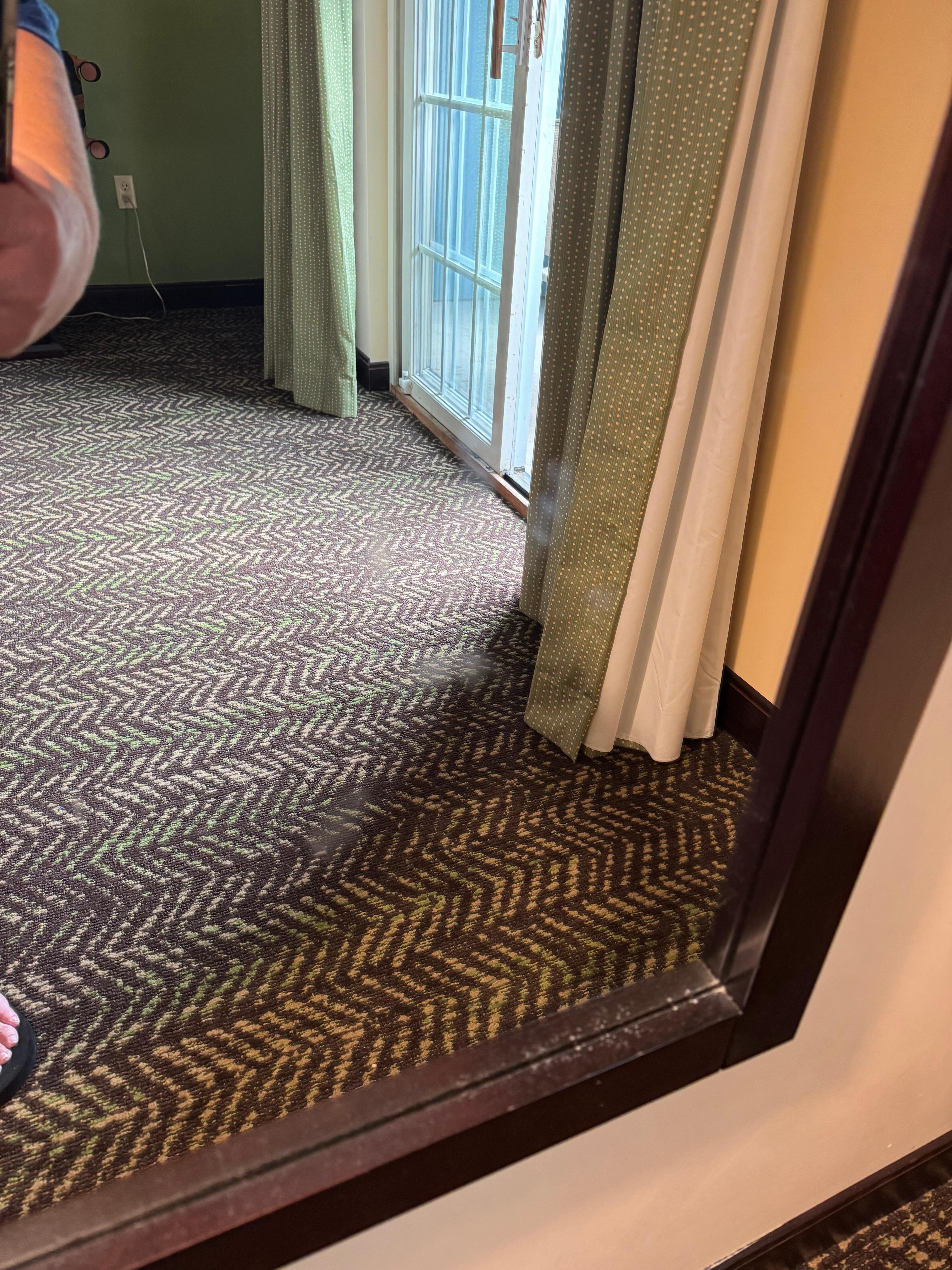 Hand prints and someone's kisses on the mirrors.
Does not really show up in photo