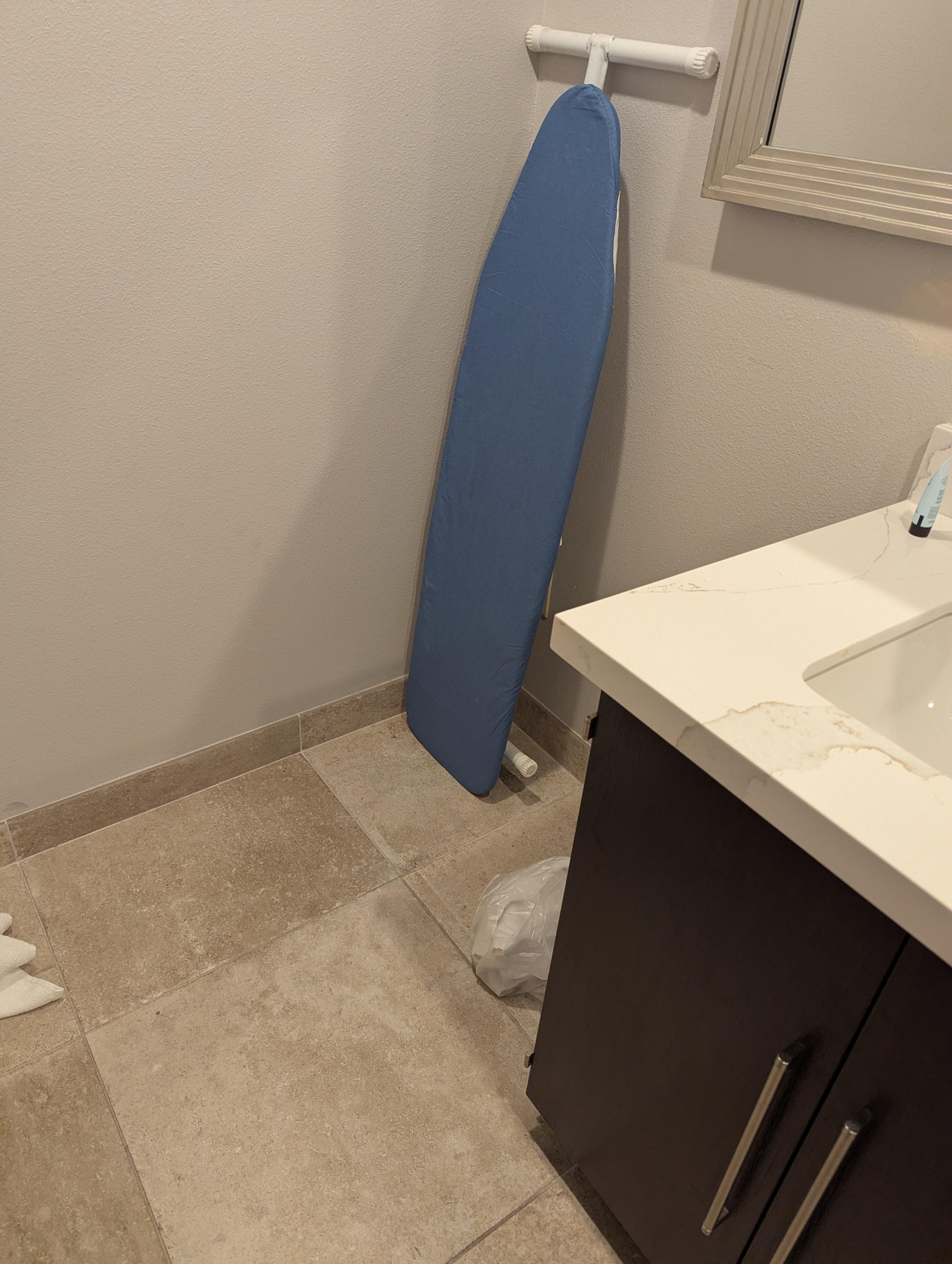 bathroom, no storage tacky board.