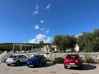 Parking below the villa, the space is large enough for a marquee