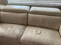 Cracked and stained couch