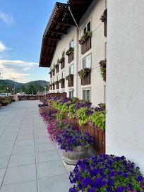 Bavarian Lodge with flowers in bloom.