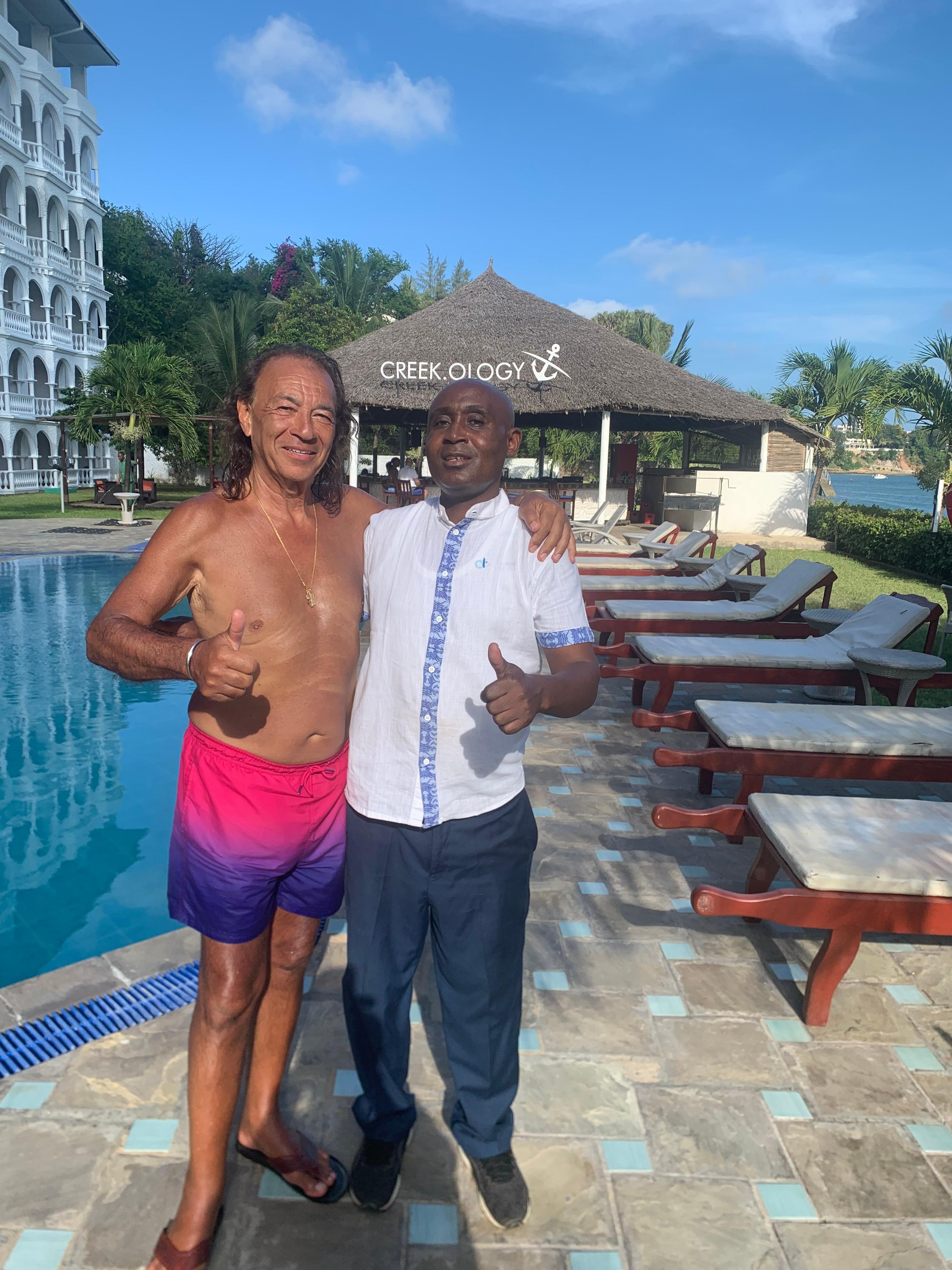 At the pool side with Albert who looked after us 