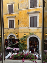 Studio view. Pizzeria just across the street. This was the second room here we stayed in. This room includes a kitchenette!
