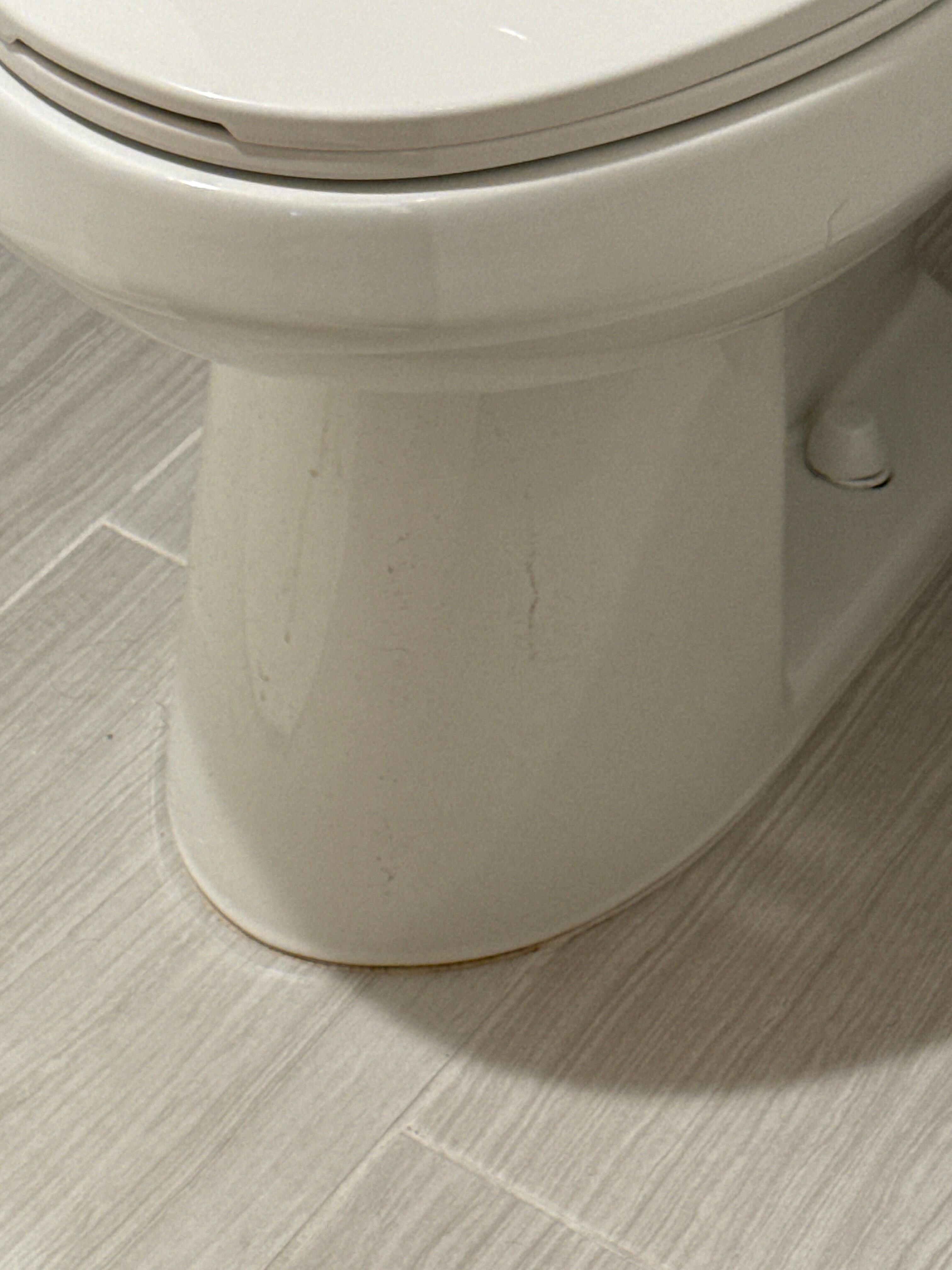 Urine on base of toilet