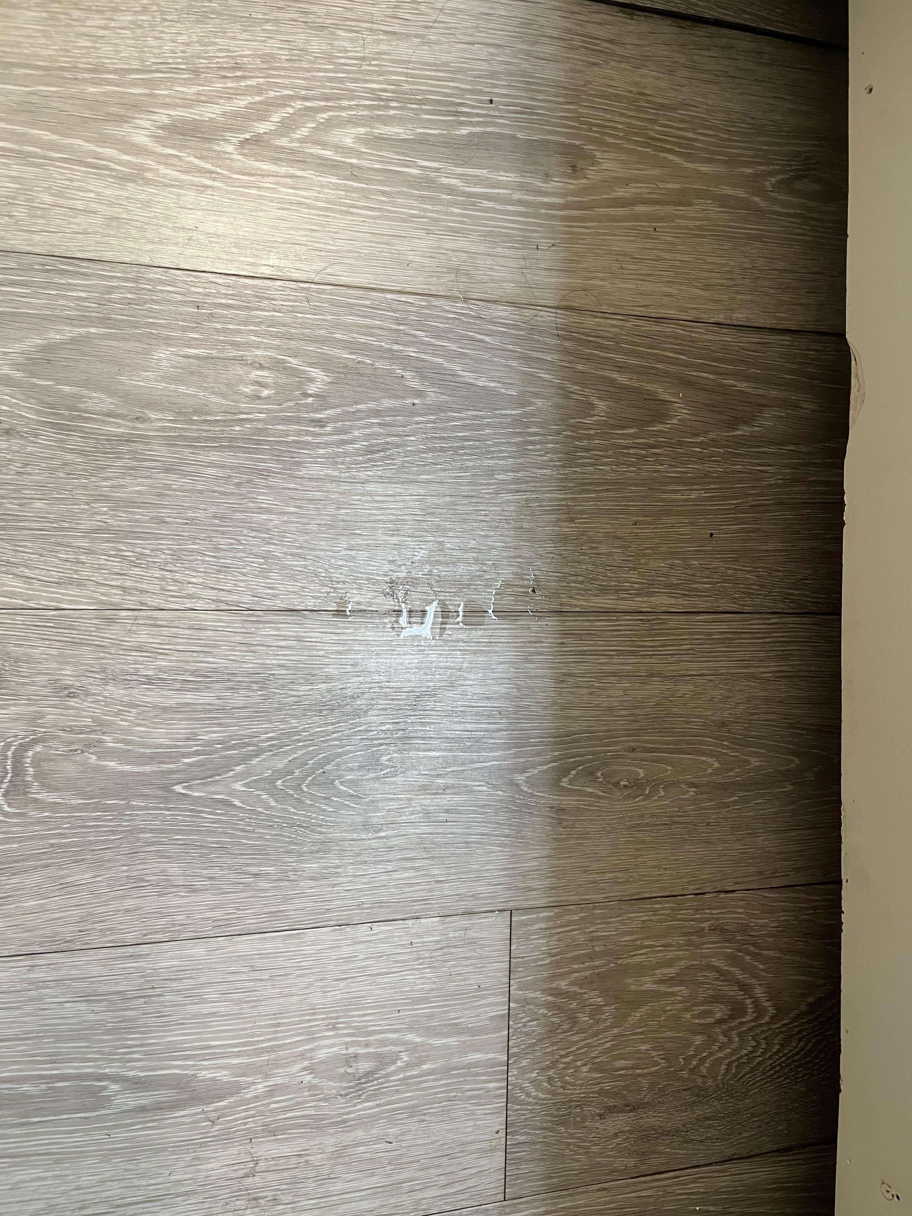 Floor puddle from sink leak