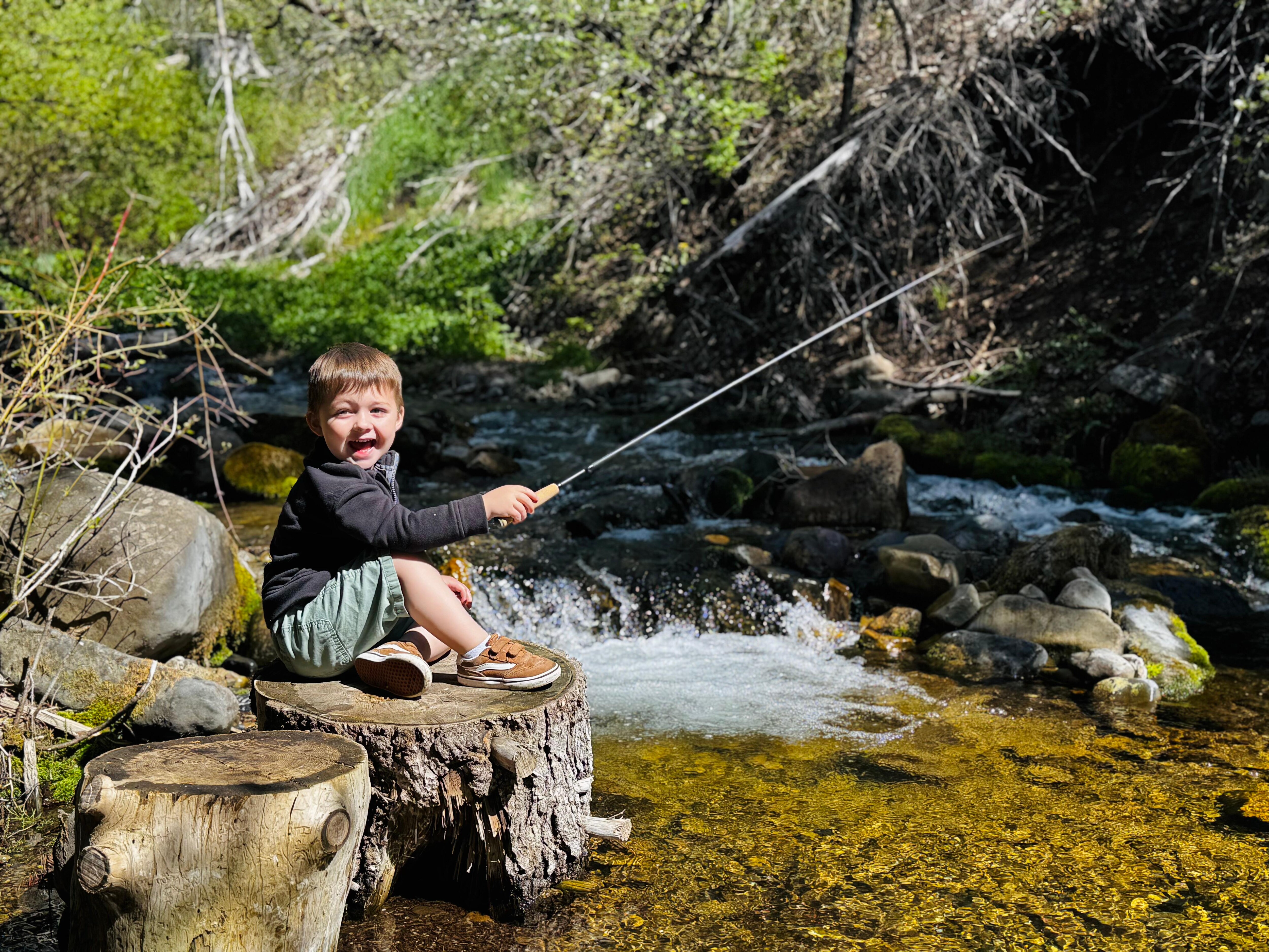 Fishin with Grandson in the small stream below the cabin