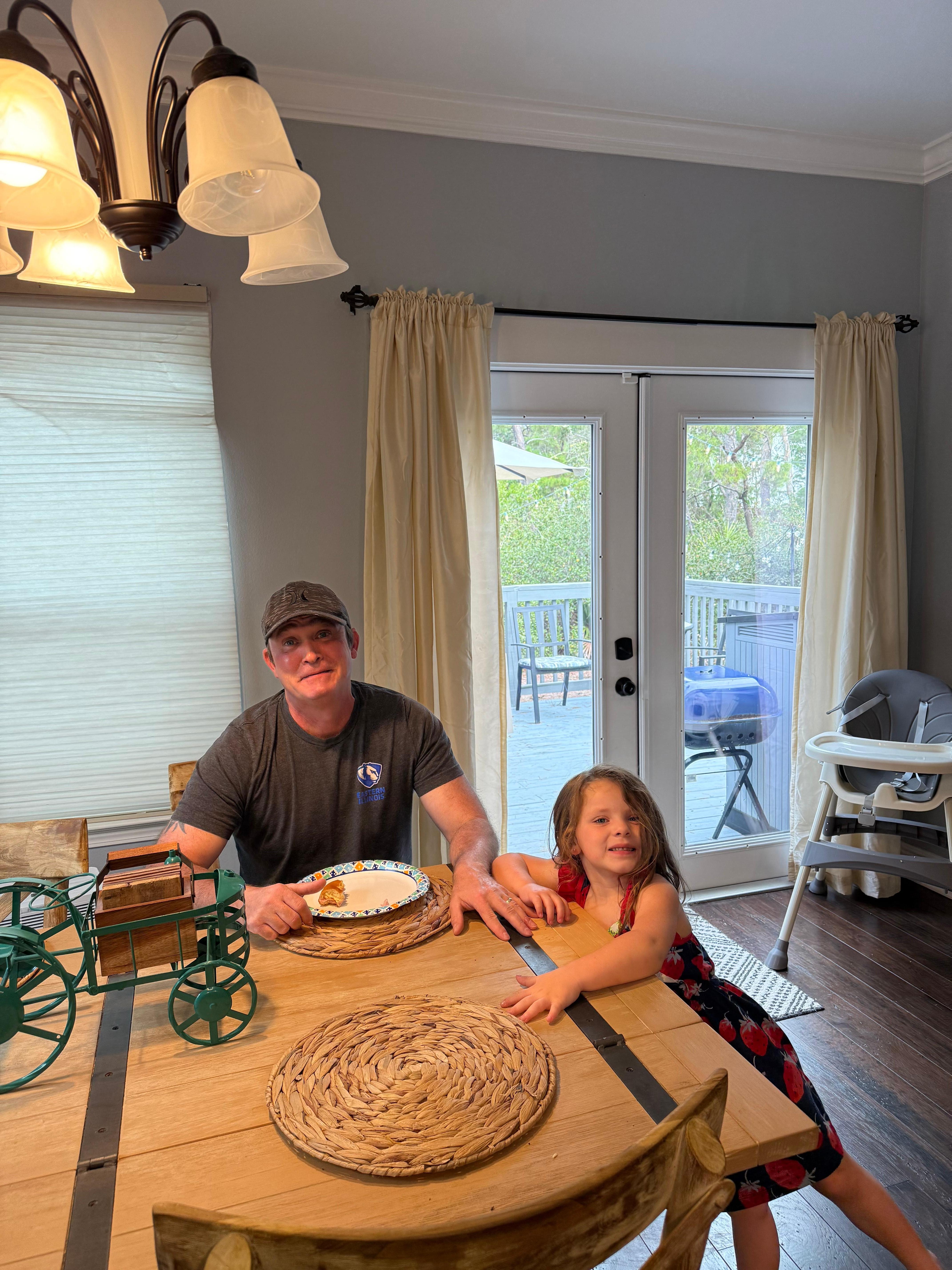 My husband and our granddaughter having some breakfast 
