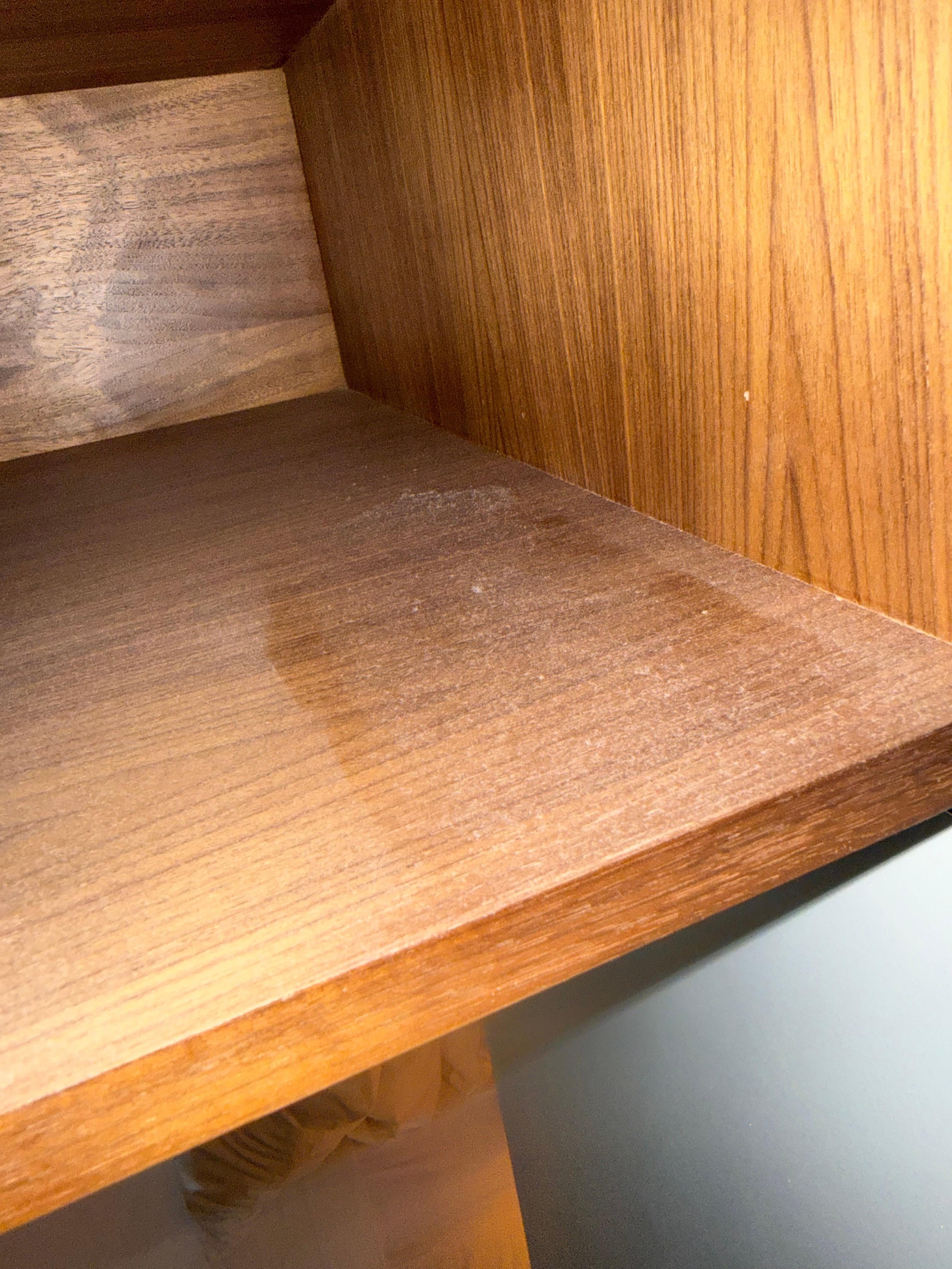 Top shelves look like they’ve never been cleaned. 